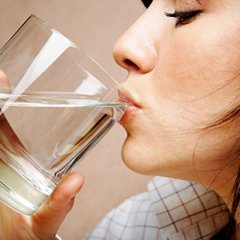 woman-drink-water-for-beautiful-skin