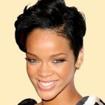 Rihanna short curly hair - Entertainment Weekly's toast