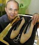 Jimmy Choo and a pair of shoes
