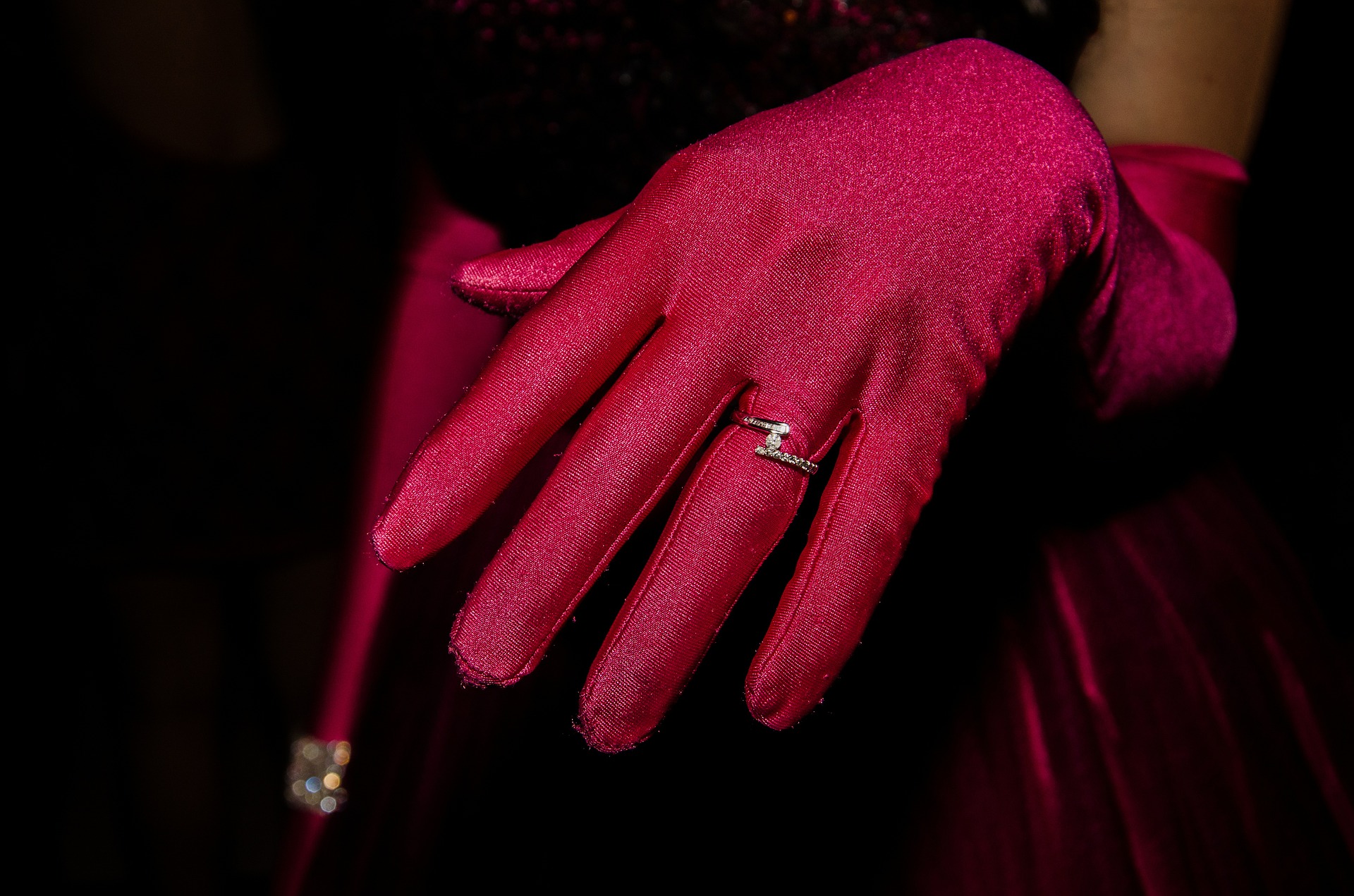 Hand with glove and ring