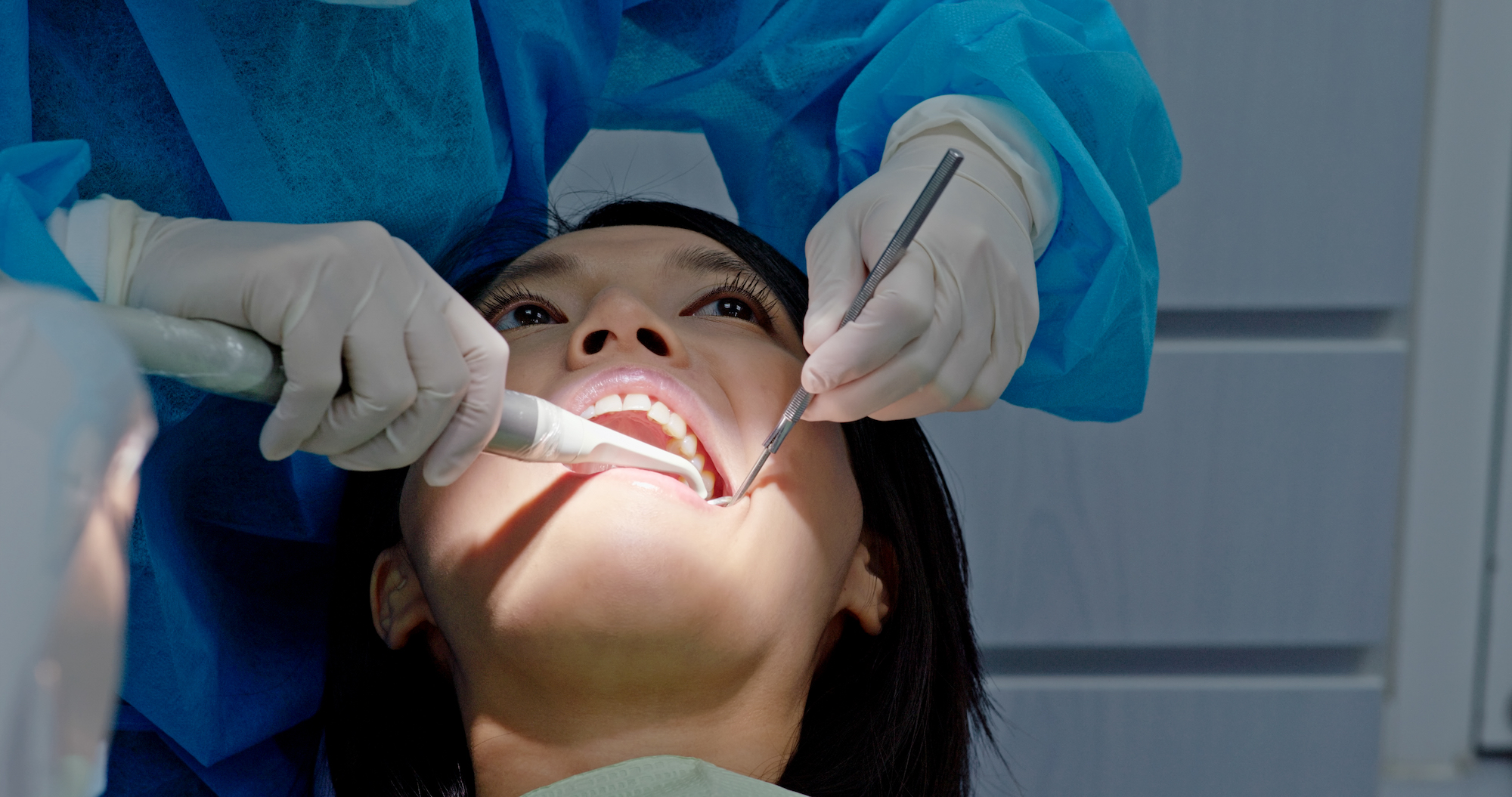 Woman undergo dental check up
