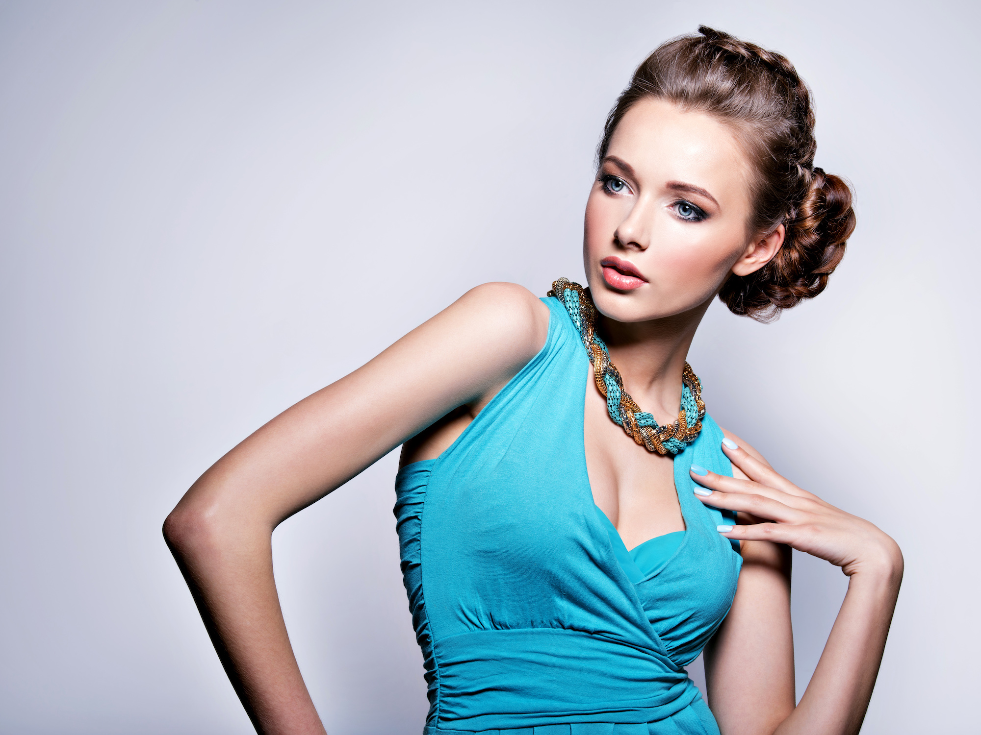 Young beautiful woman with jewelry.