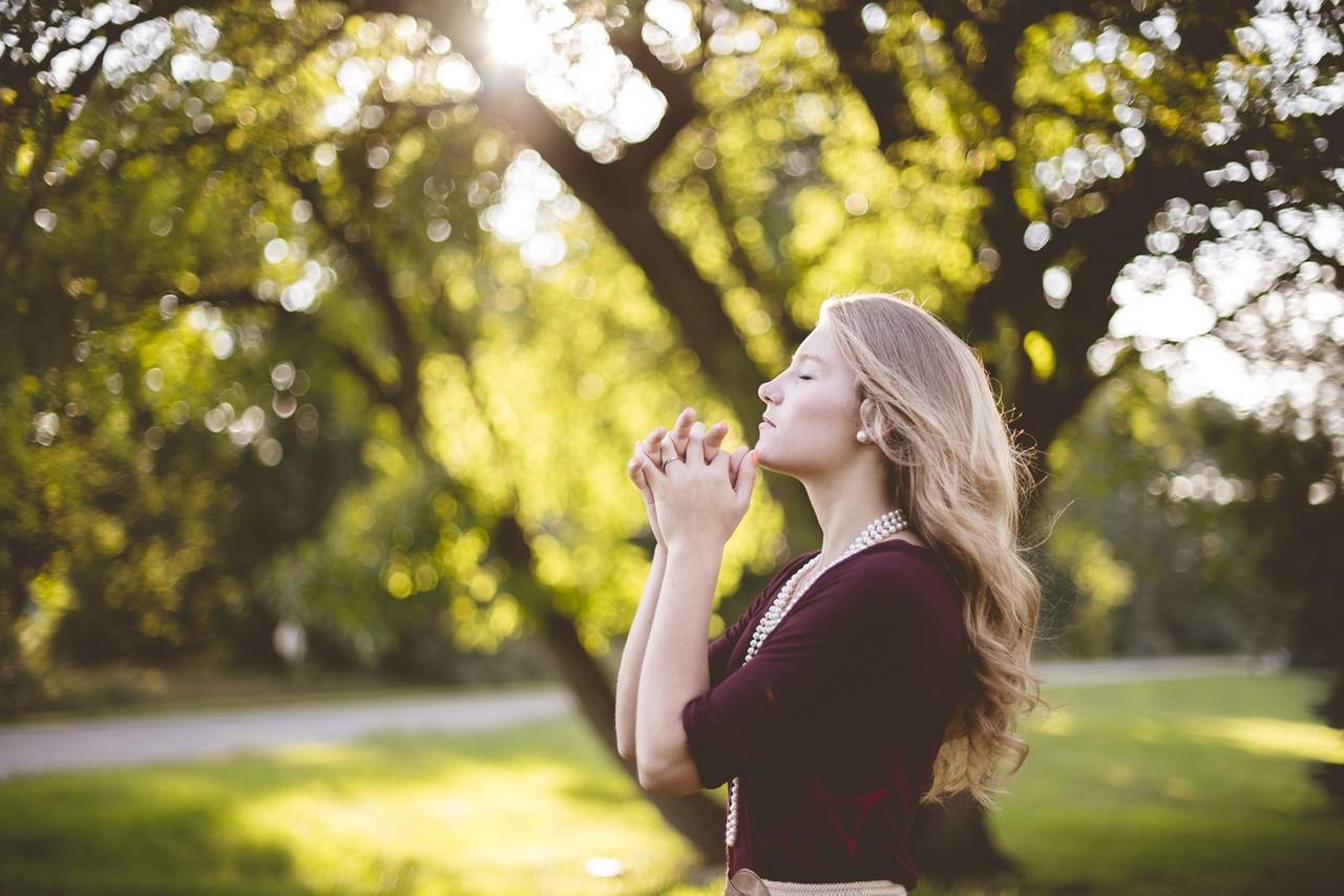 woman under a tree