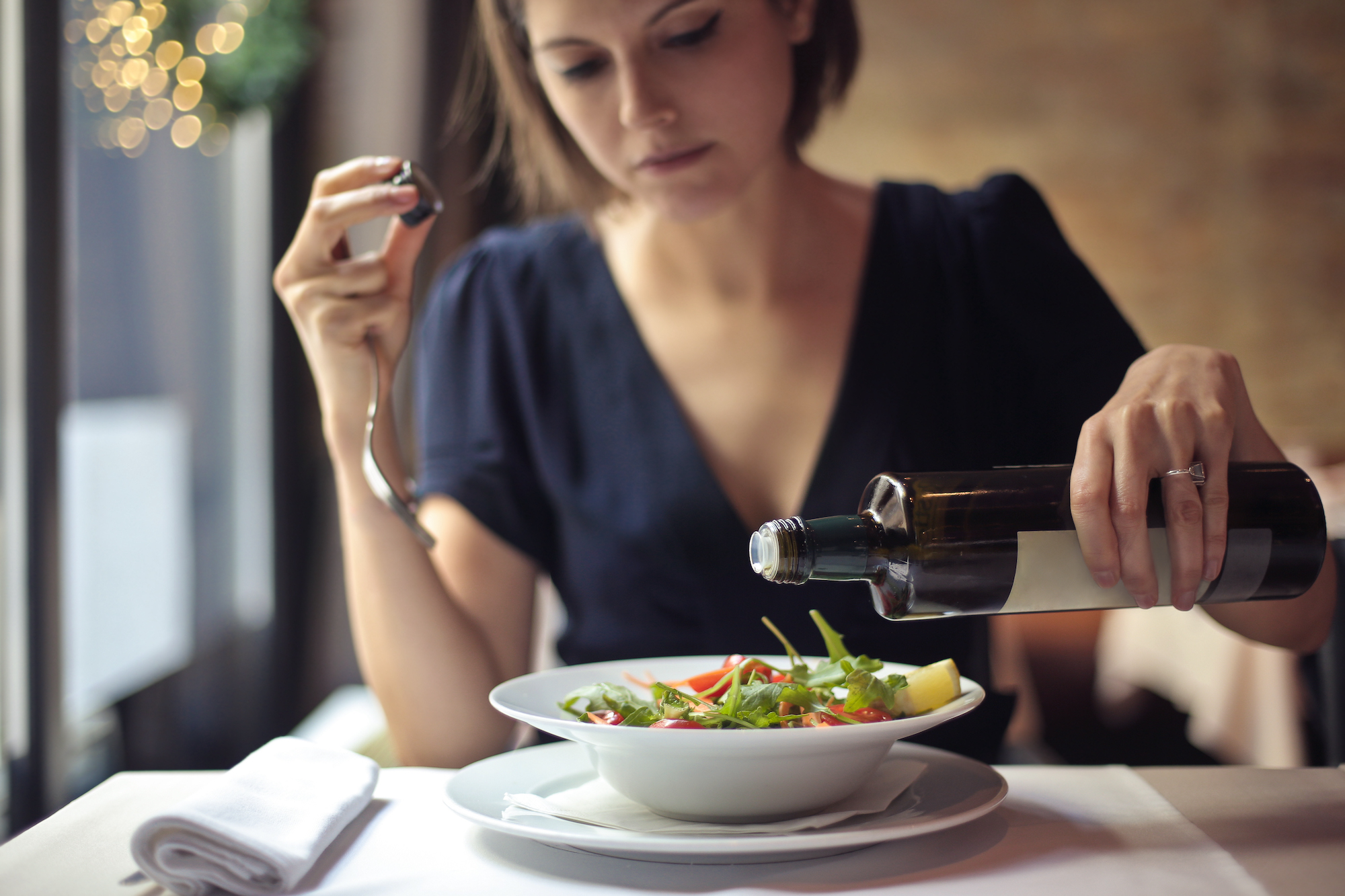 woman eating a salad
