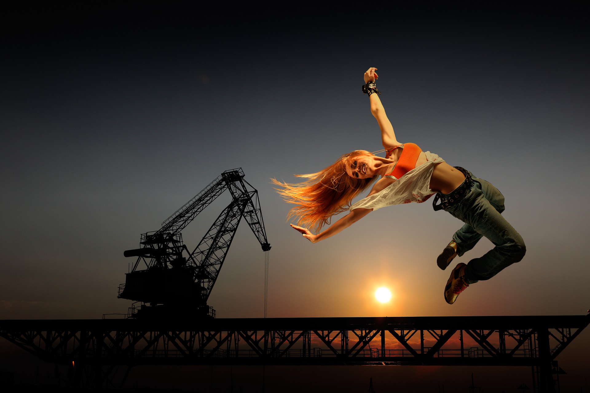 girls in jeans leap - artistic