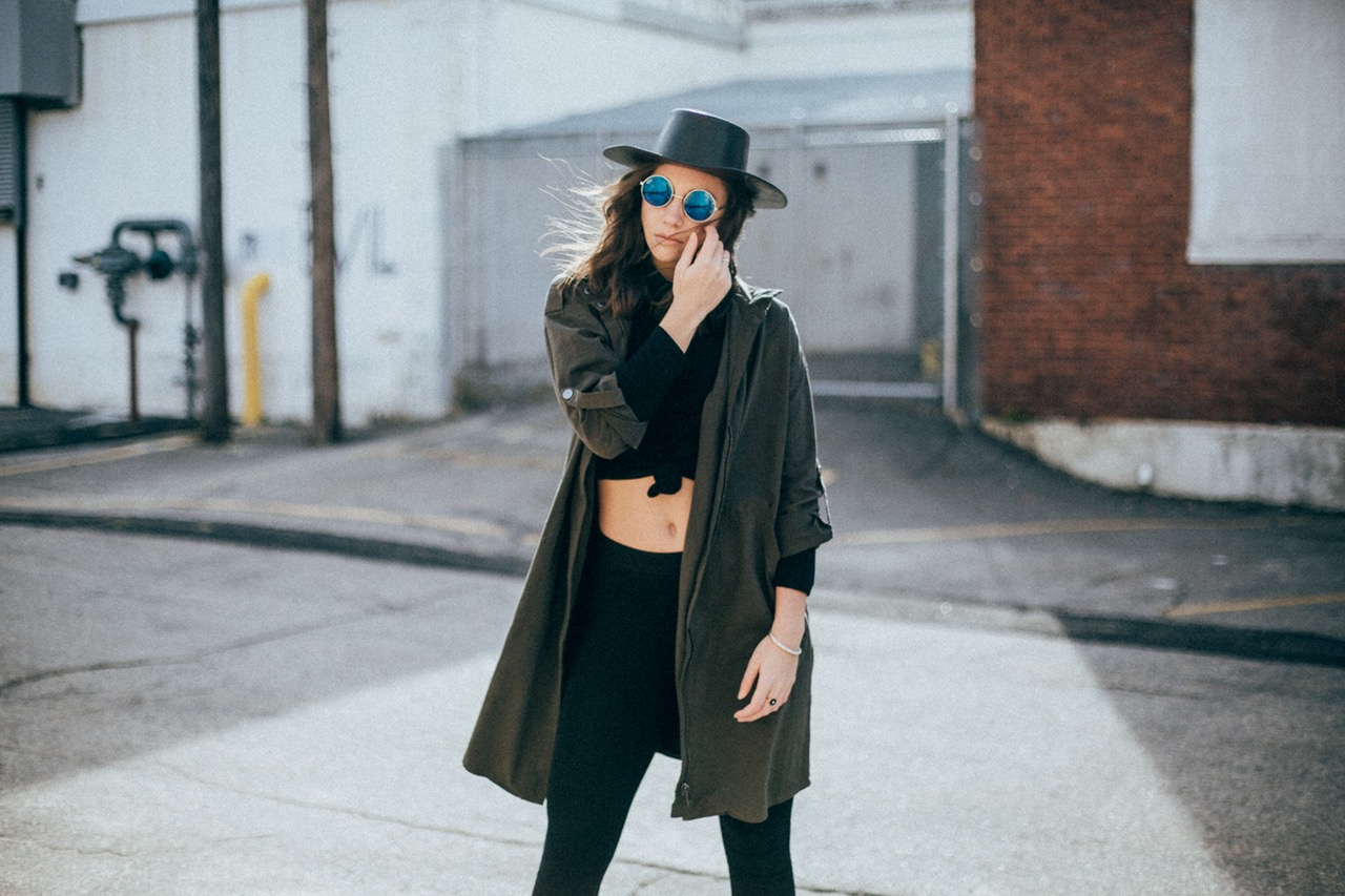 stylish girl with hat and glasses